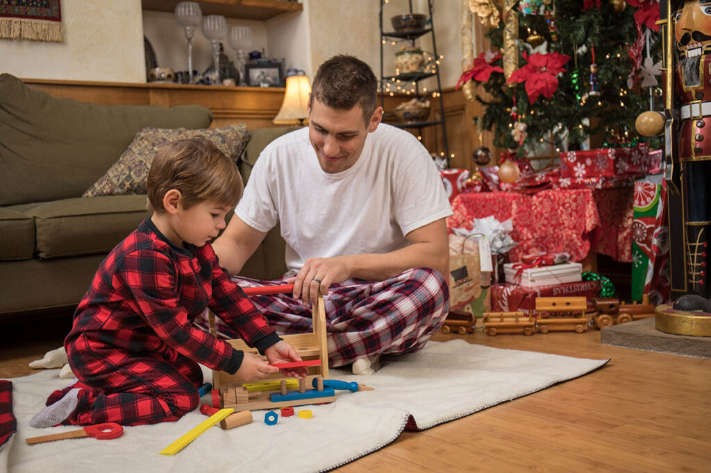 Family playing with building toy set