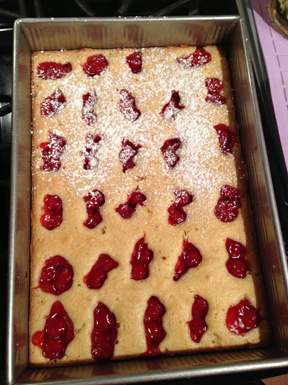 Holiday Squares fresh out of the oven! Just golden brown, with the powdered sugar over half the pan.