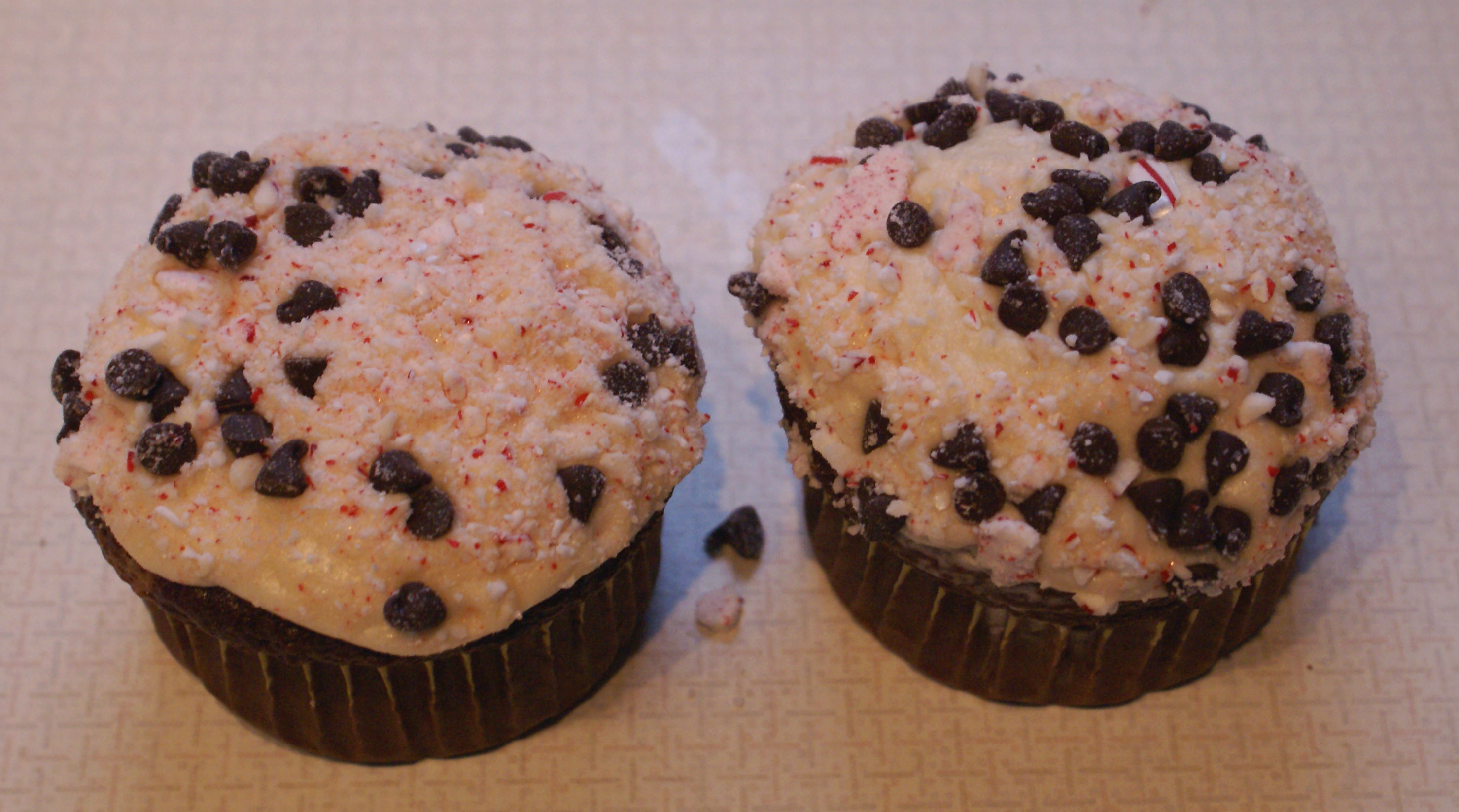 Chocolate mint cupcakes, with vanilla icing, topped with crushed Lehman's Old-Fashioned Sugar Stick Candy in Peppermint.