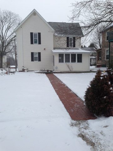 House In Snow