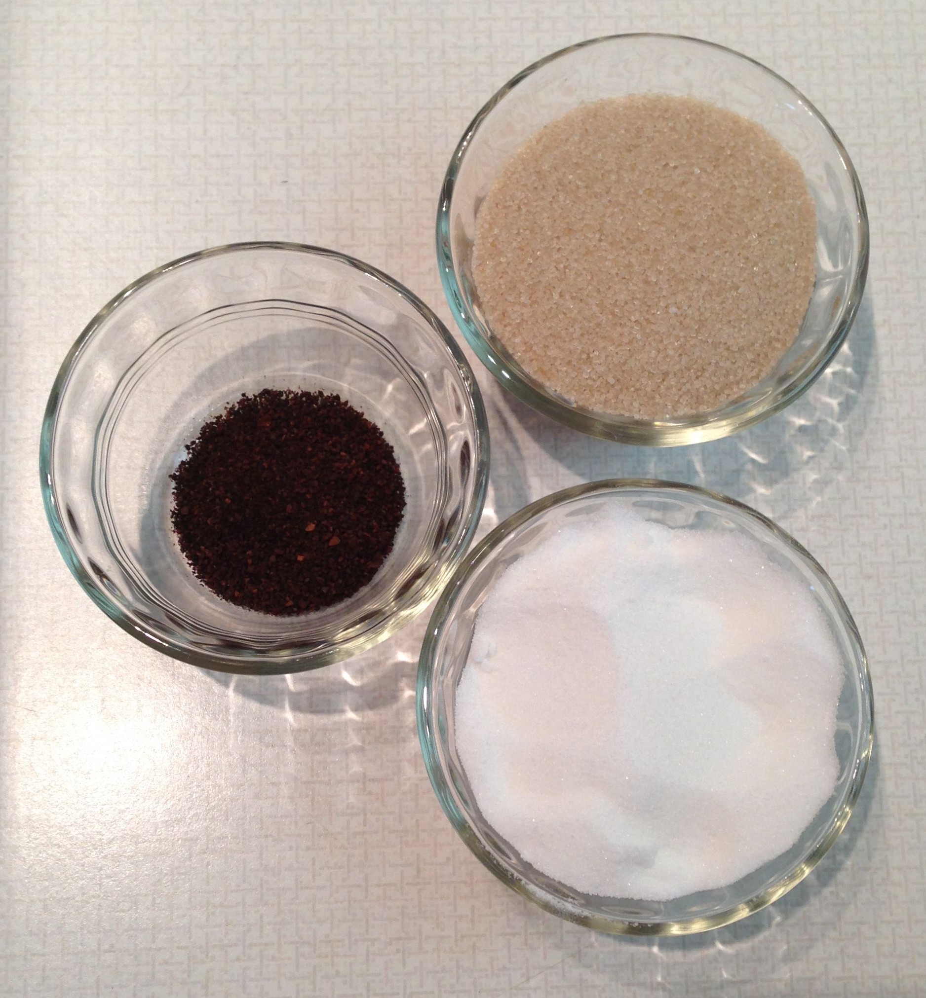 At top, turbinado sugar, at bottom white sugar; coffee on the left.