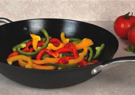 Make a stirfry with this innovative, lightweight cast iron wok. Available at Lehmans.com.