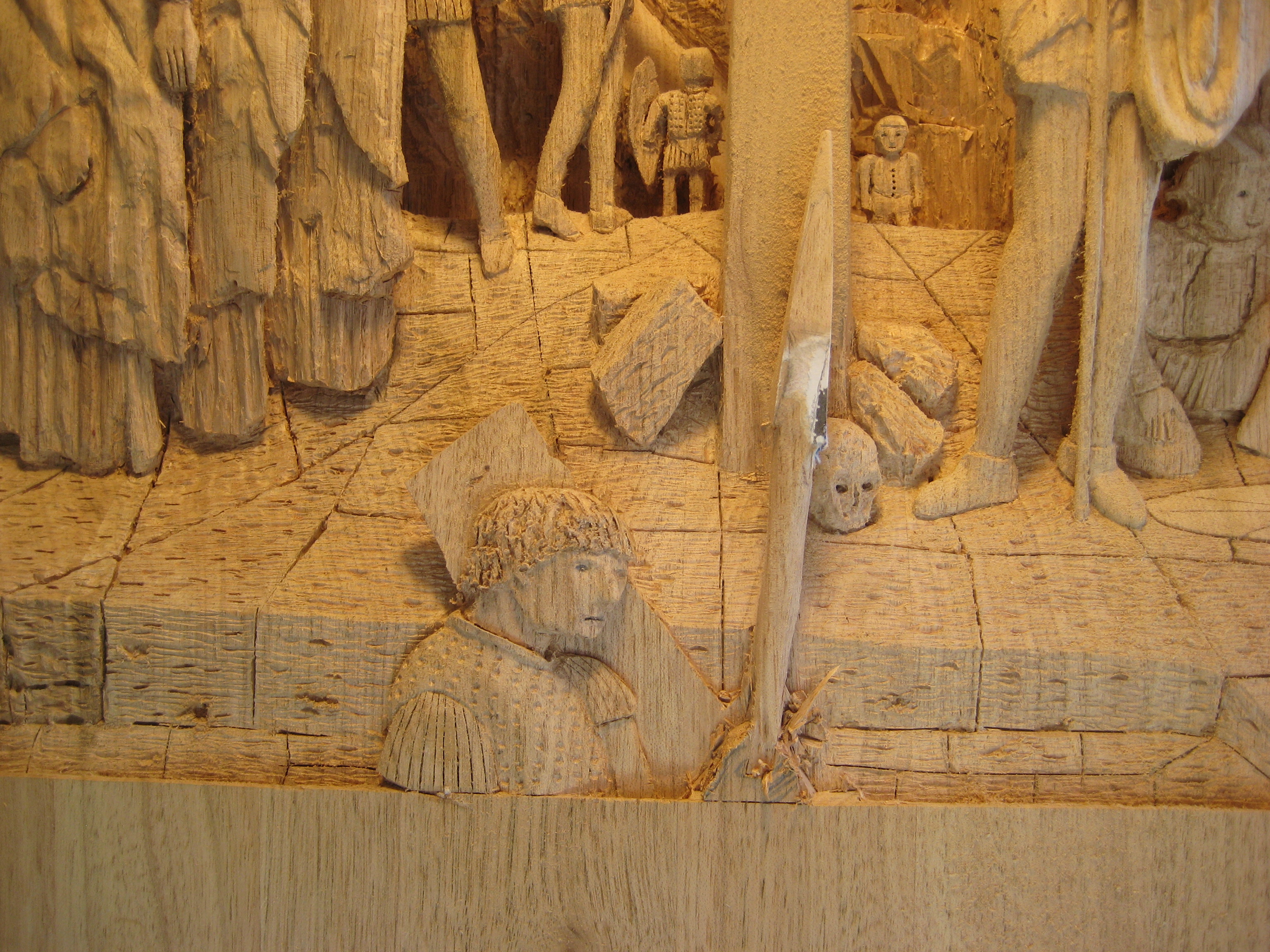 Here, Weaver's doing the finishing detail on his "Crucifixion" carving. Note the depth of the relief, which is seen in all his work.