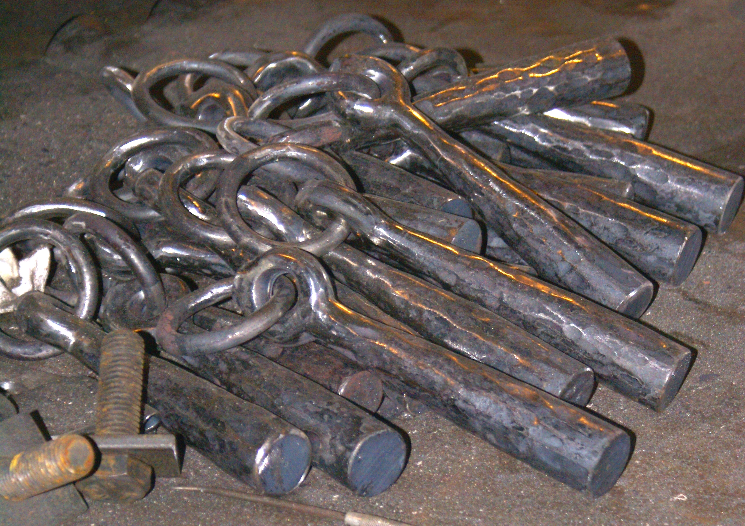 Forged iron fence stretchers being made.