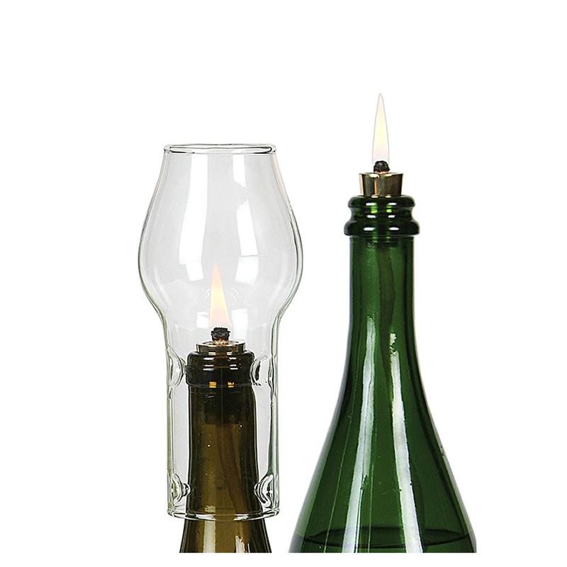 Repurposed wine bottles made into oil lamps from Lehmans.com.