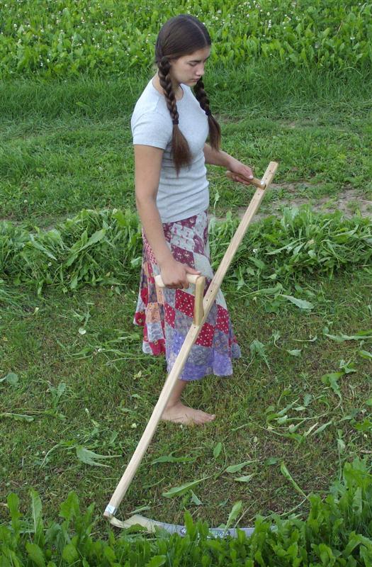 The snath is the wooden handle to which the scythe blade is affixed. Both are available at Lehman's in Kidron, Ohio or at Lehmans.com.