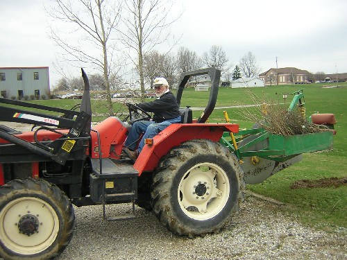 jay with tractor of trees