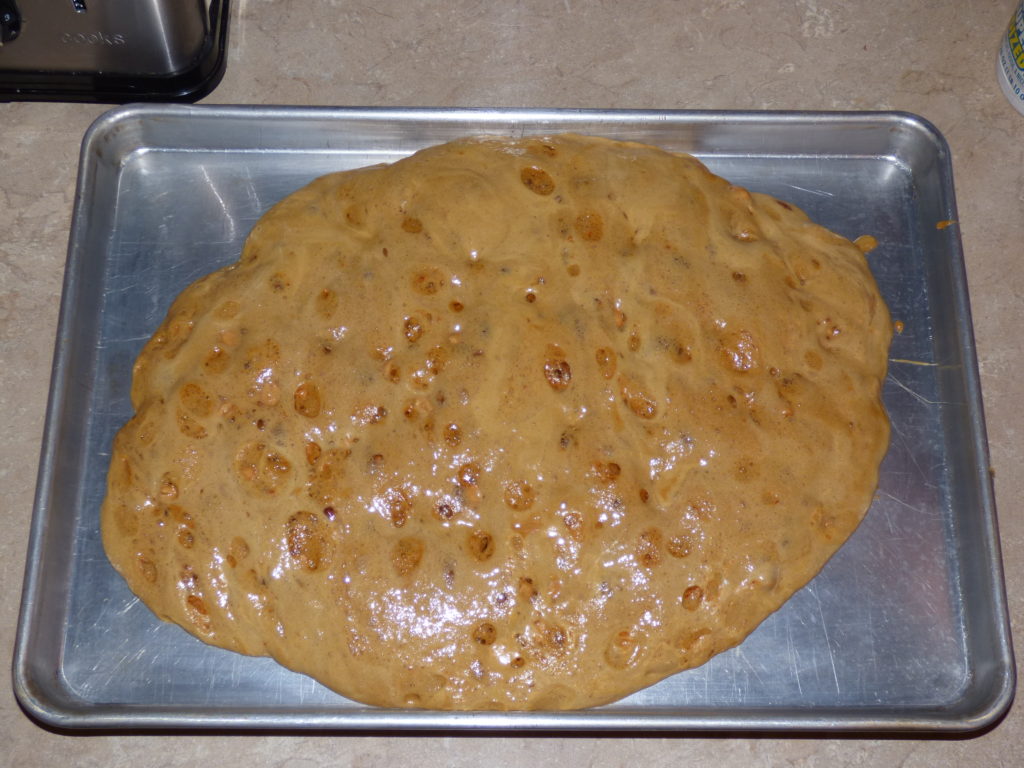 Poured out onto greased cookie sheet.