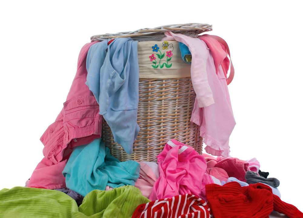 Saving money on your family's laundry can be as simple as training them to wear clothing more than once.