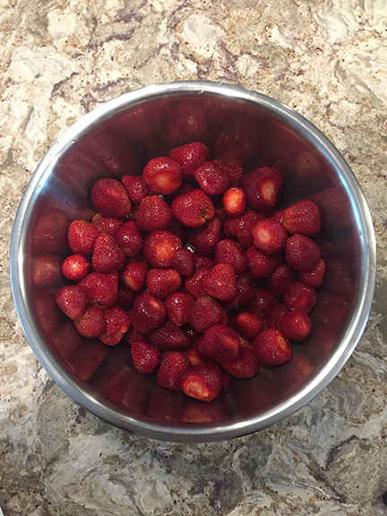 hulled strawberries in bowl