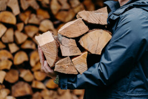 carrying firewood from splitting wood