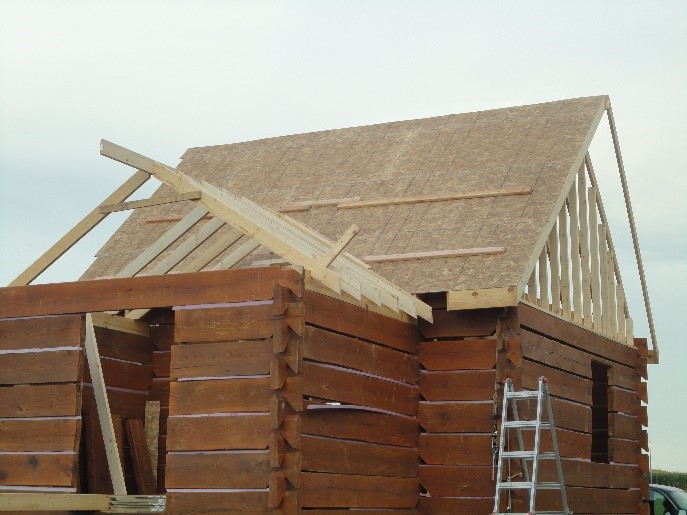 adding roof to log cabin
