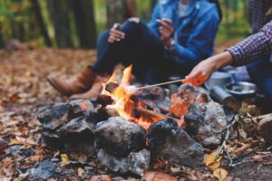 roasting marshmallows over campfire