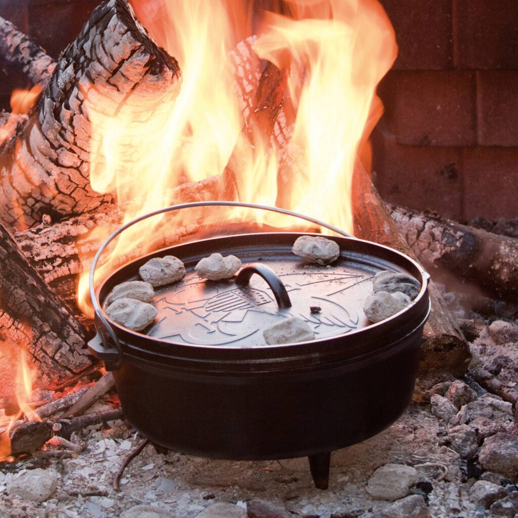 Lodge Cast Iron Dutch Oven over campfire