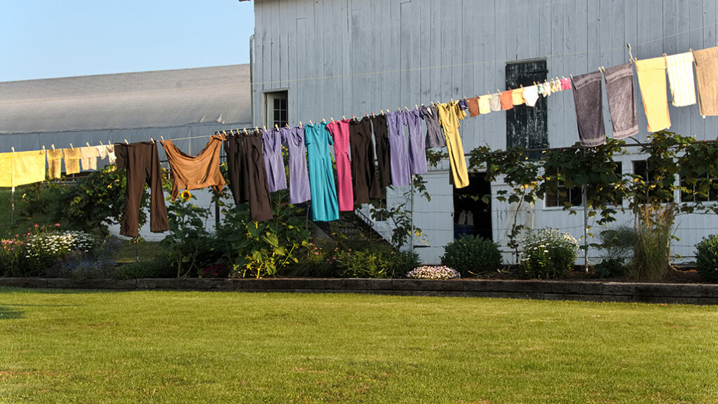 Laundry on clothesline outside in sunlight