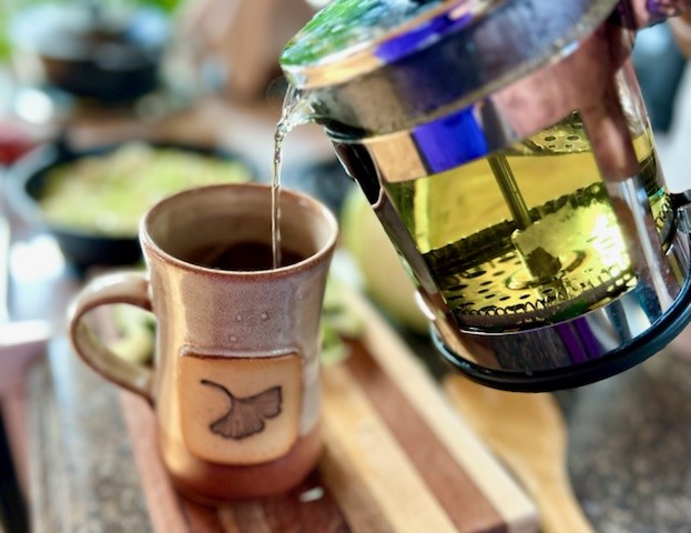 Pouring herbal tea