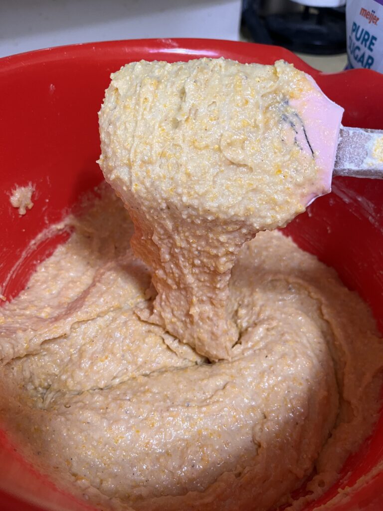 Mixing wet ingredients for honey cornbread