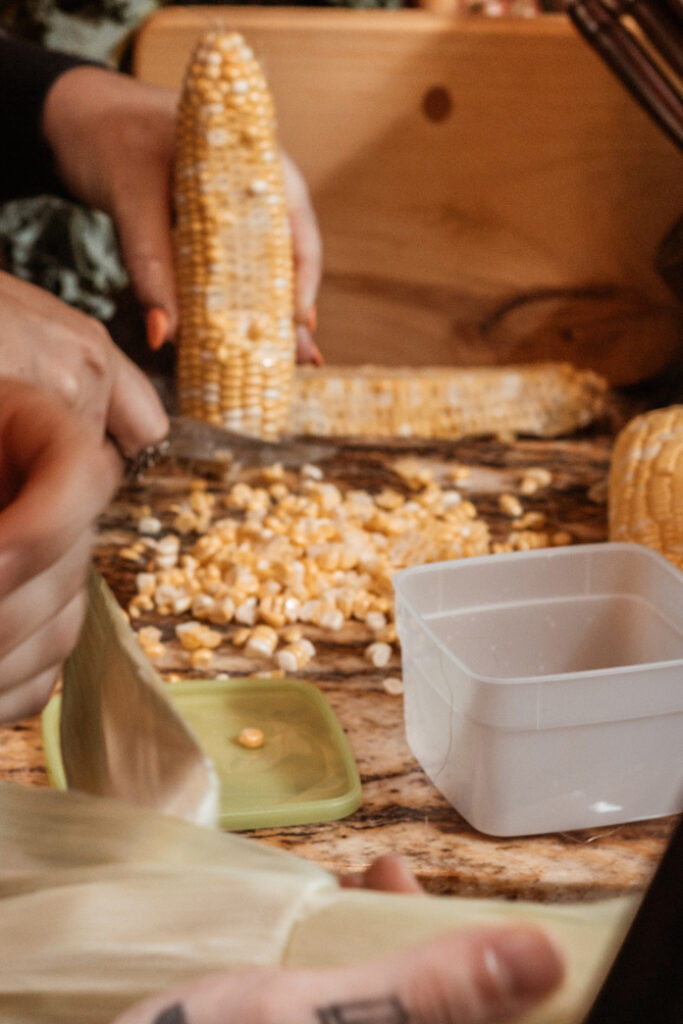 Cutting corn off the cob for freezing