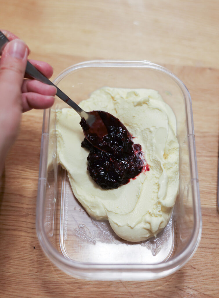 layering in black raspberries with ice cream