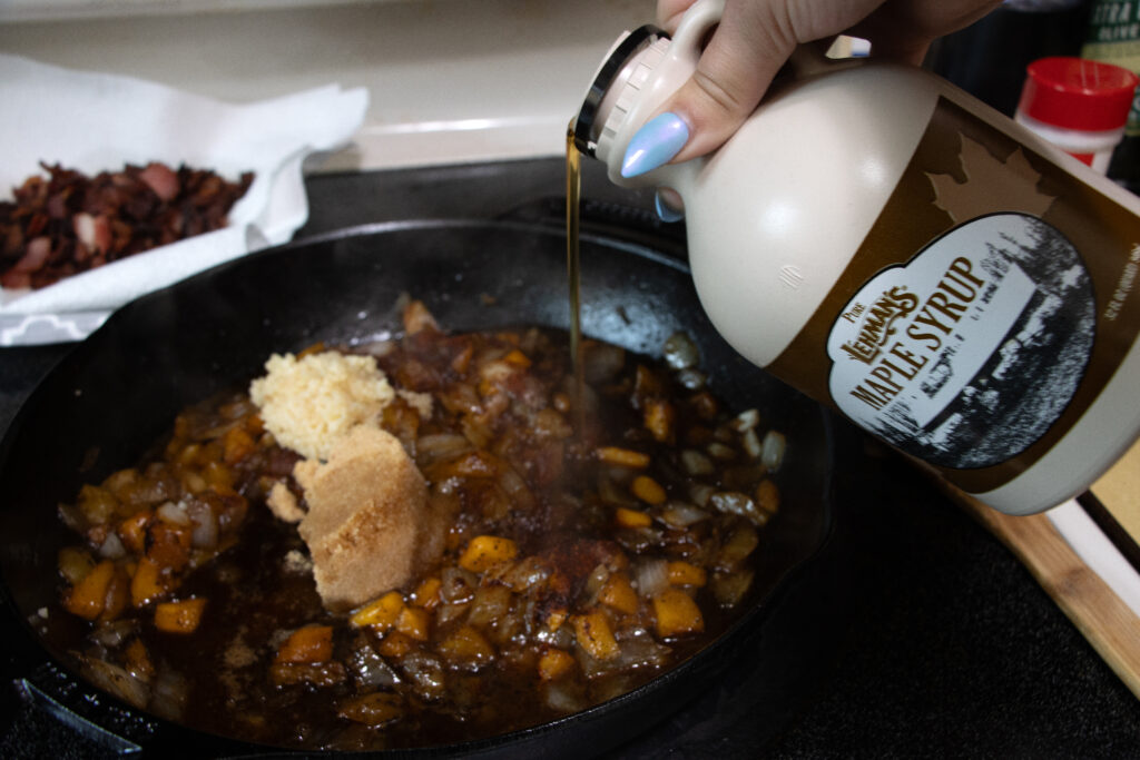 pouring maple syrup into pan