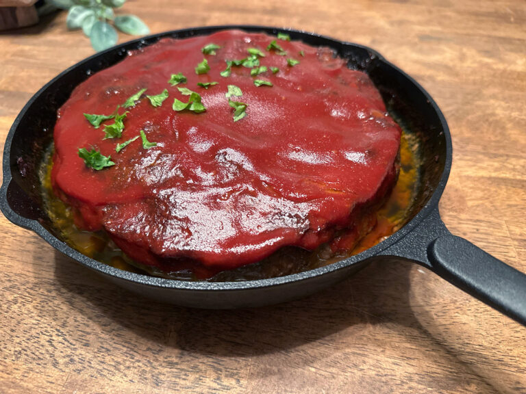 Meatloaf cooked in cast iron skillet