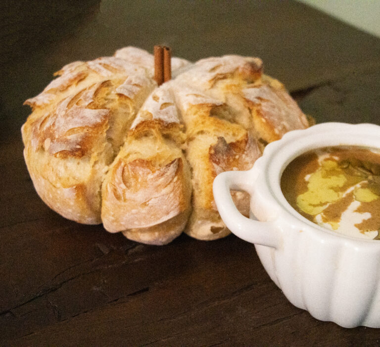 Pumpkin shaped sourdough and a bowl of soup